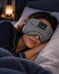 VELMUNE Bluetooth sleep mask headphones worn by a side sleeper in bed